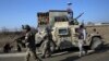 Security personnel arrive near the site of an attack near the Bagram Air Base In Parwan province of Kabul, Afghanistan, Wednesday, Dec. 11, 2019. A powerful suicide bombing Wednesday targeted an under-construction medical facility near the Bagram…