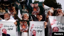 د مسلم لیګ نواز ګوند غړي د نوازشریف، مریم نواز او مېجر صفدر د سزا کېدو د پرېکړې په ضد احتجاج کوي.