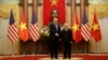 U.S. President Donald Trump shakes hands with Vietnamese President Nguyen Phu Trong