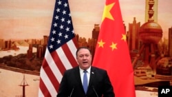 Ngoại trưởng Mike Pompeo phát biểu trong cuộc họp báo chung với Ngoại trưởng Trung Quốc Vương Nghị tại Đại lễ đường Nhân dân ở Bắc Kinh ngày 14/6/2018.