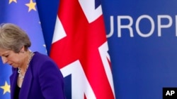 Thủ Tướng Anh, Theresa May, sau khi phát biểu tại EU summit, Brussels, 18 tháng 10, 2018.