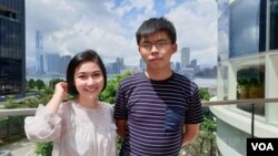 Luật sư Trần Kiều Ngọc và nhà hoạt động Hong Kong, Joshua Wong, hồi 2019.