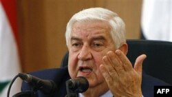 Bộ trưởng Ngoại giao Syria Walid al-Moallem nói chuyện tại một cuộc họp báo trong thủ đô Damascus, Syria hôm 24/1/12